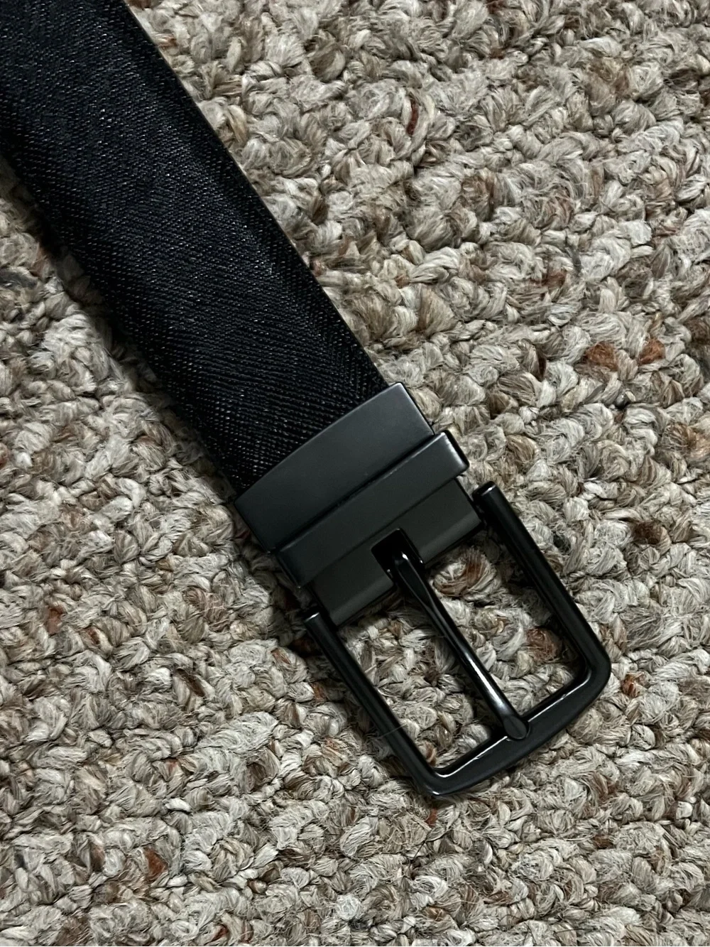 Brown/Black reversible belt. Size small. Heavy gray buckle. Great condition.